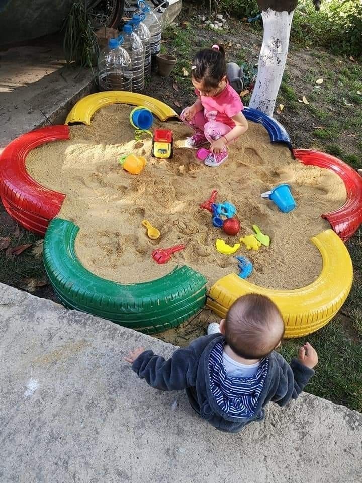 Colorful Tire Flower Sandbox Delight