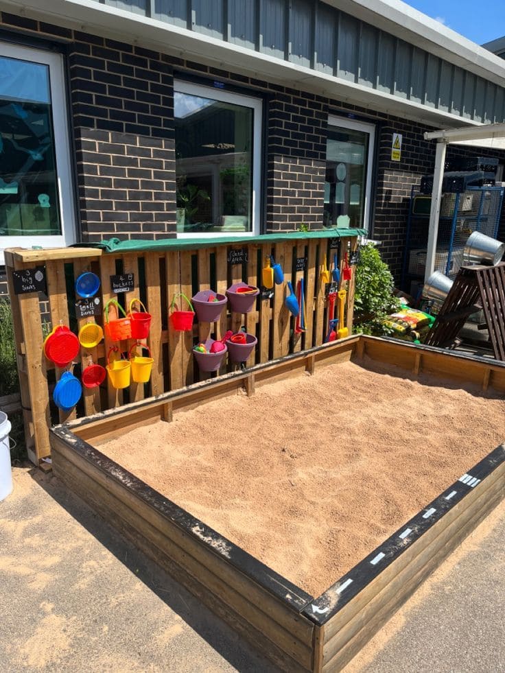 Creative Backyard Sandbox with Organized Storage
